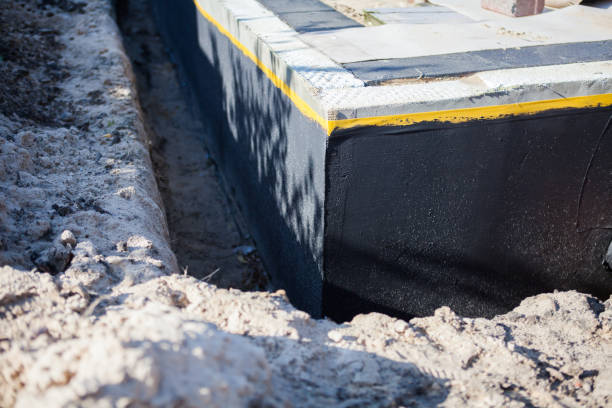 Professional Waterproofing technician working in Bascom, OH